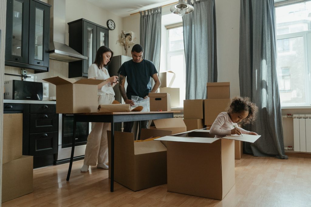 Family Opening Parcels inside house